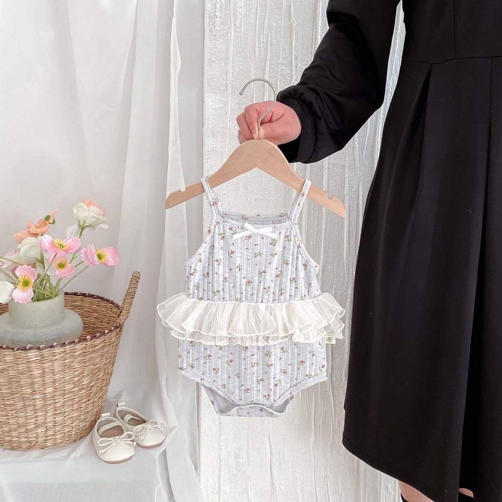 Traje de una pieza con lazo floral para bebé niña