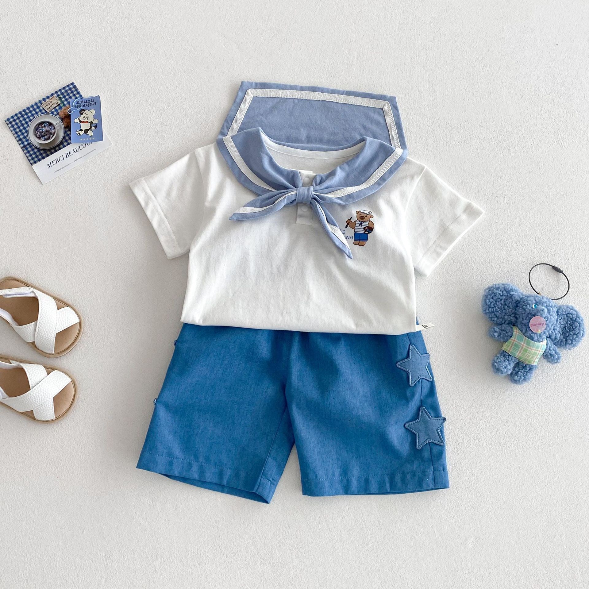 Abbigliamento estivo per bambini con design orsetto