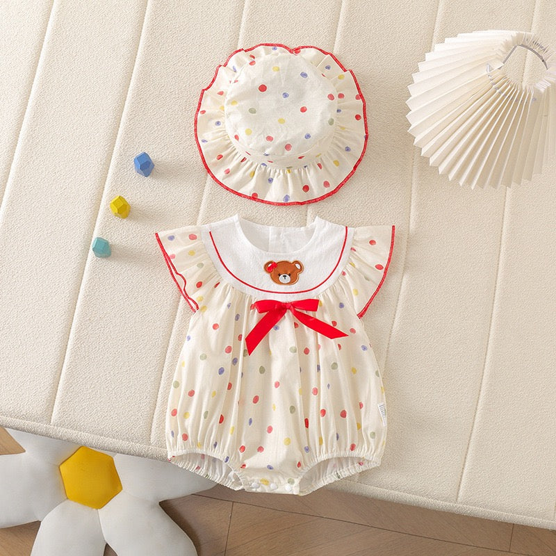 Mameluco de bebé con lunares y osito de peluche