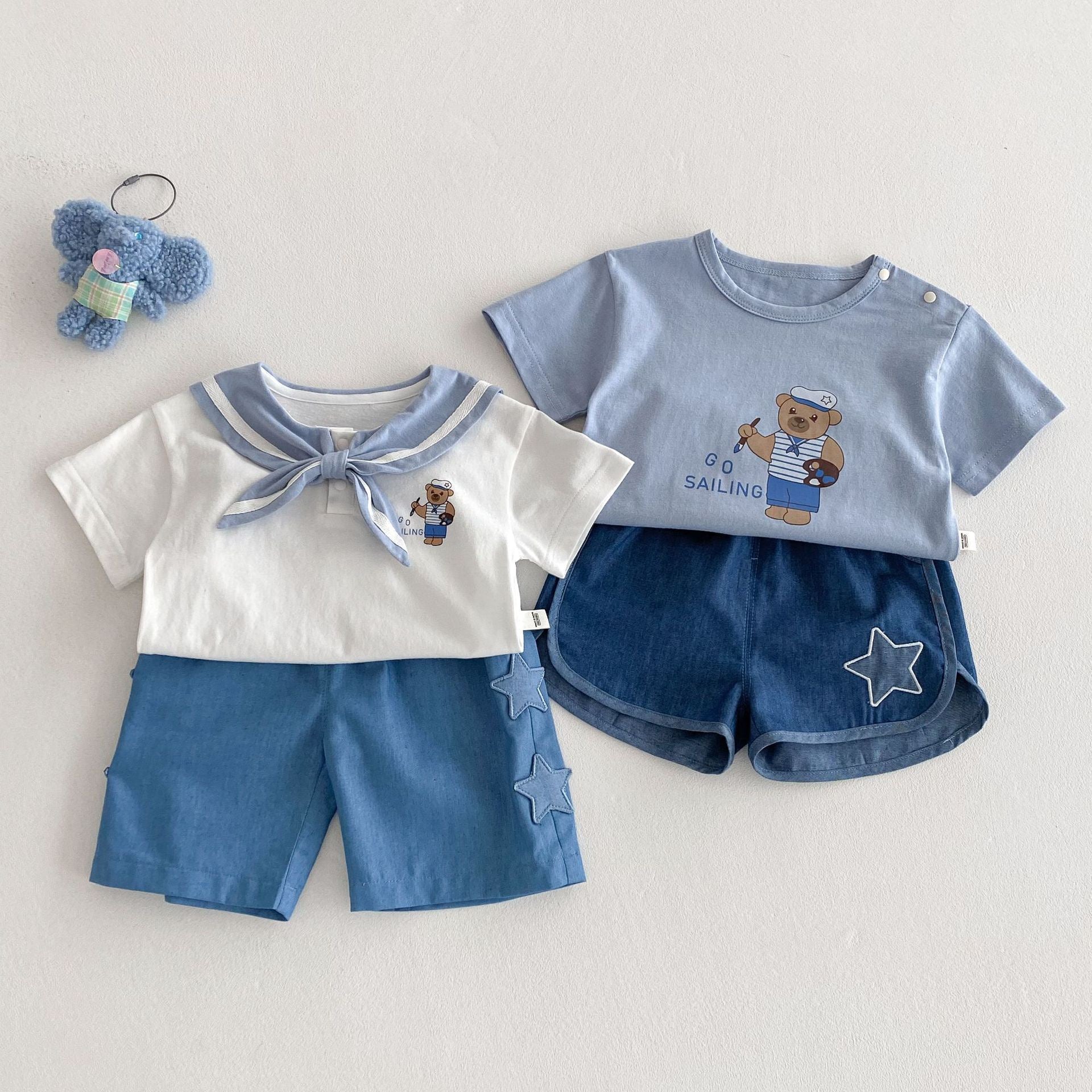 Abbigliamento estivo per bambini con design orsetto