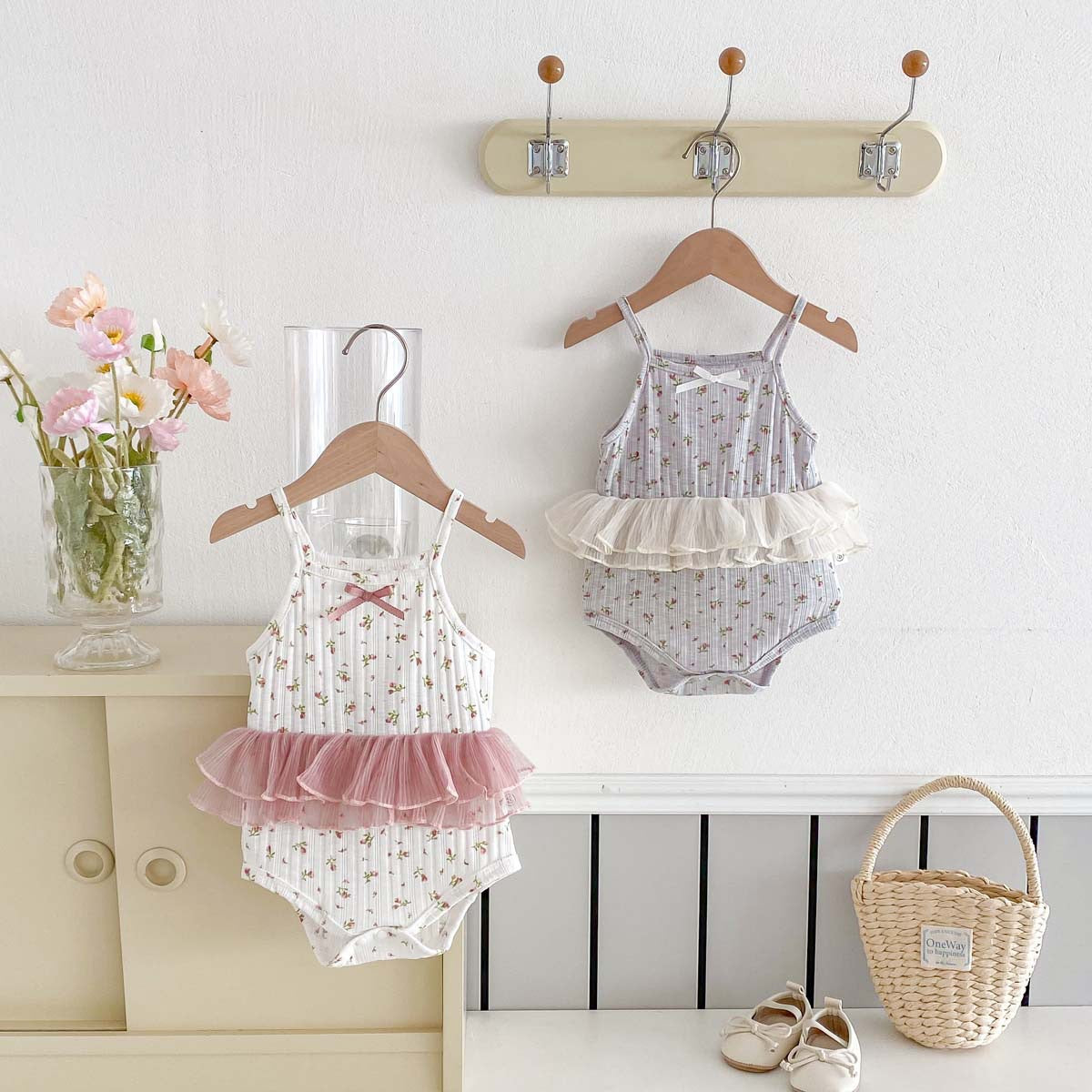 Traje de una pieza con lazo floral para bebé niña