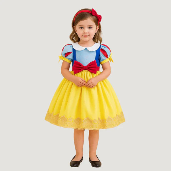 Party dress with flowers and a bow.