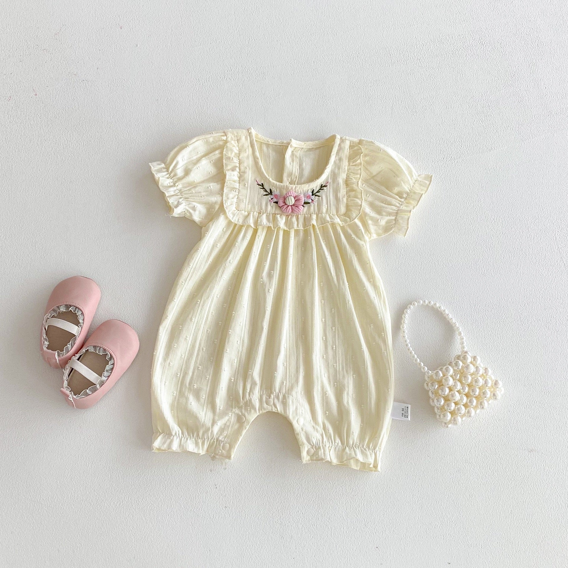 Trajes mameluco de manga corta abullonada con volantes y estampado floral para bebés