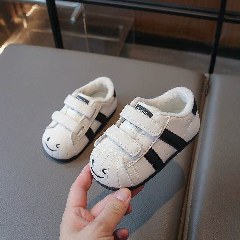 Sneakers a righe per bambini con motivo faccina