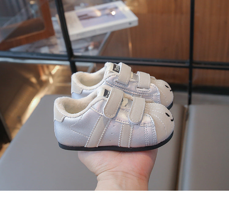 Sneakers a righe per bambini con motivo faccina