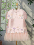 Floral dress for girls with tulle trim.