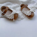 Scarpe con fiocco in pizzo da bambina
