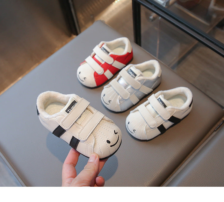Sneakers a righe per bambini con motivo faccina