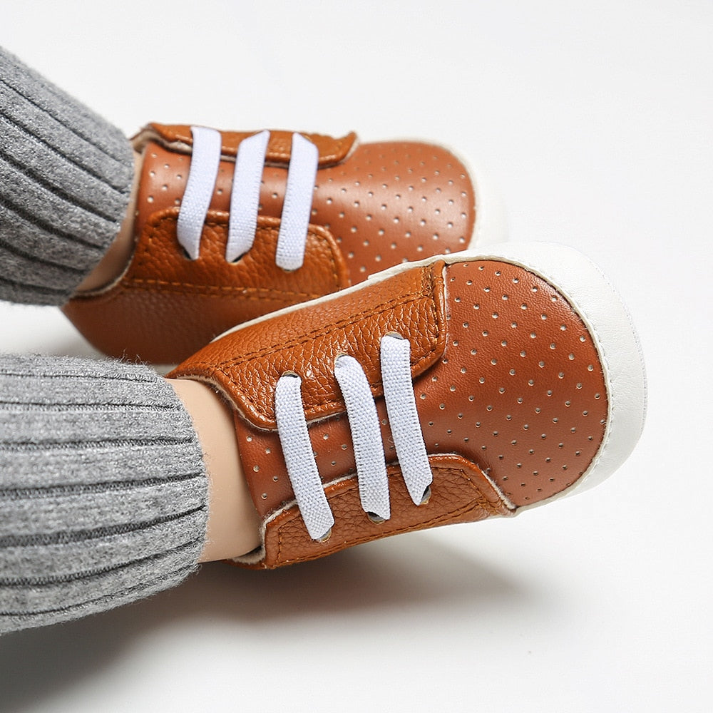 Sneakers con lacci elastici
