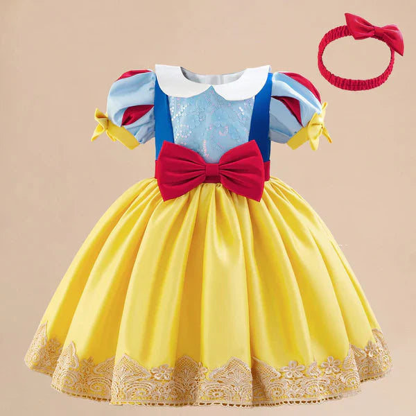 Party dress with flowers and a bow.