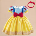 Party dress with flowers and a bow.