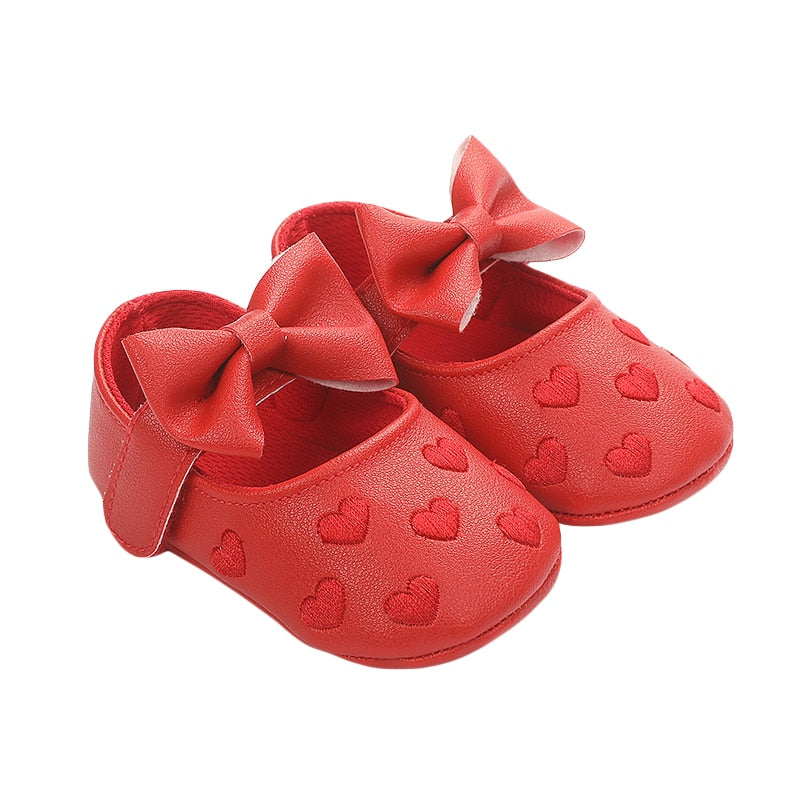 Scarpa da bambina con fiocco e cuore