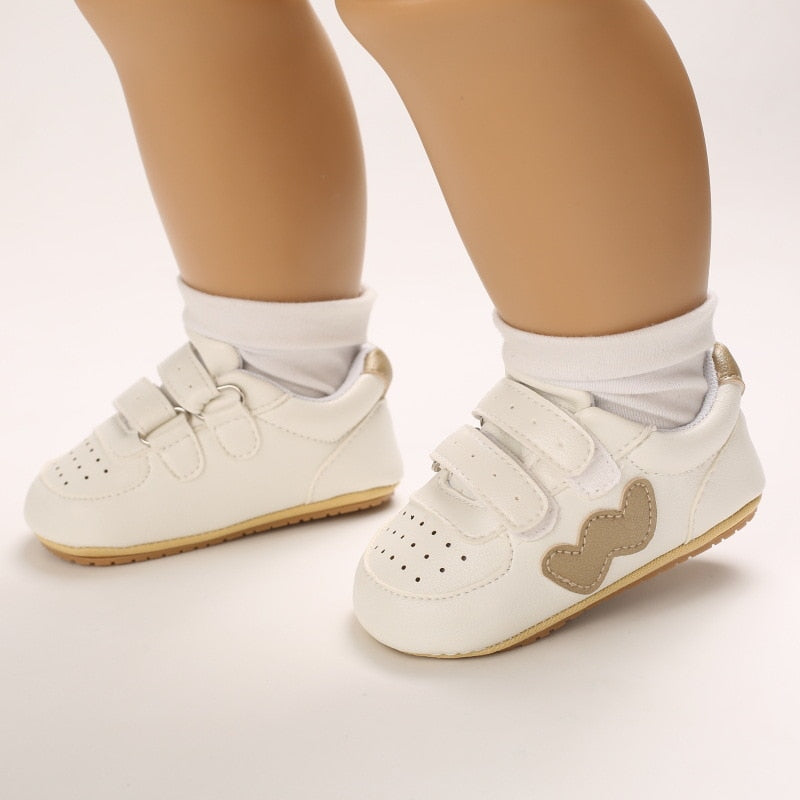 Sneakers con doppio strappo in Velcro