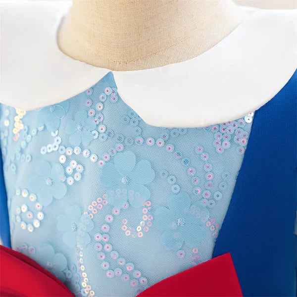 Party dress with flowers and a bow.