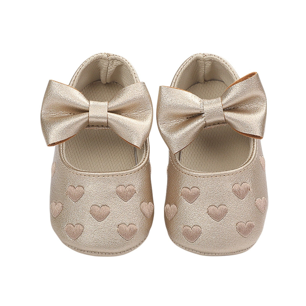 Scarpa da bambina con fiocco e cuore