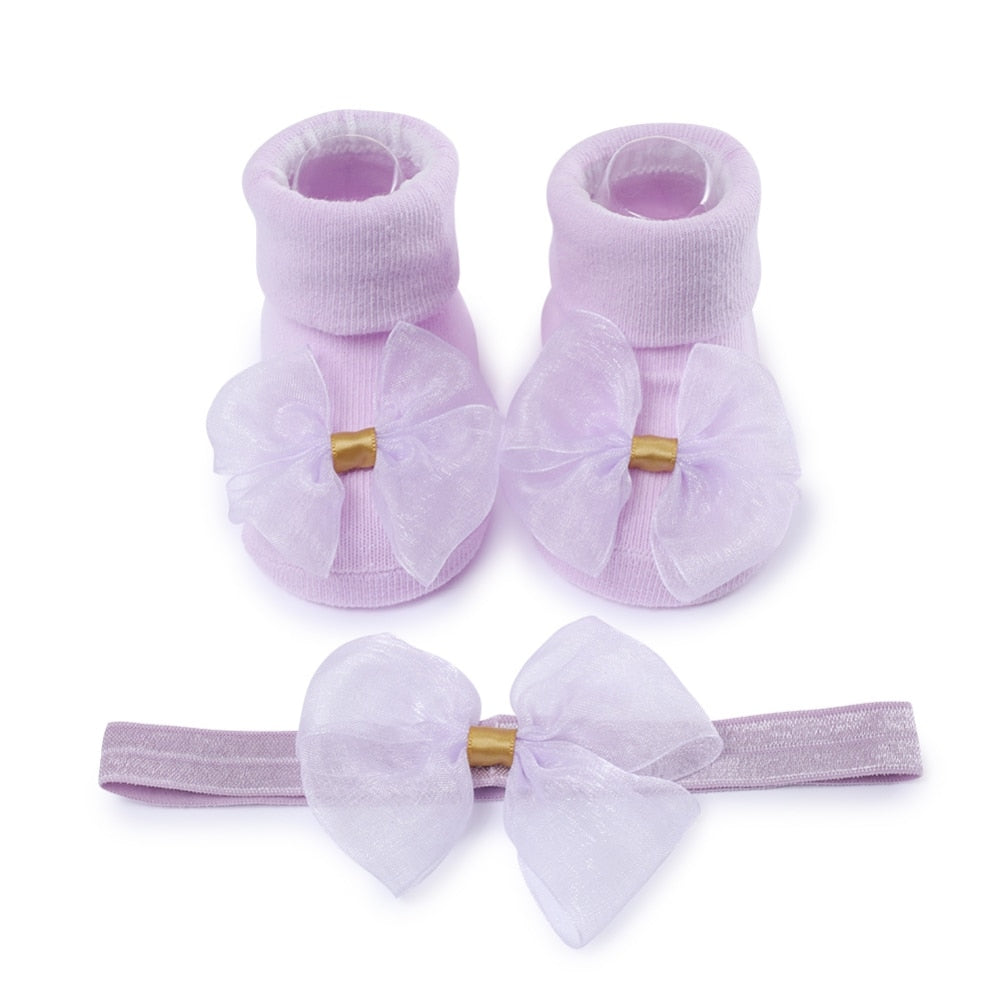 Calzino + fascia con fiocco per neonata