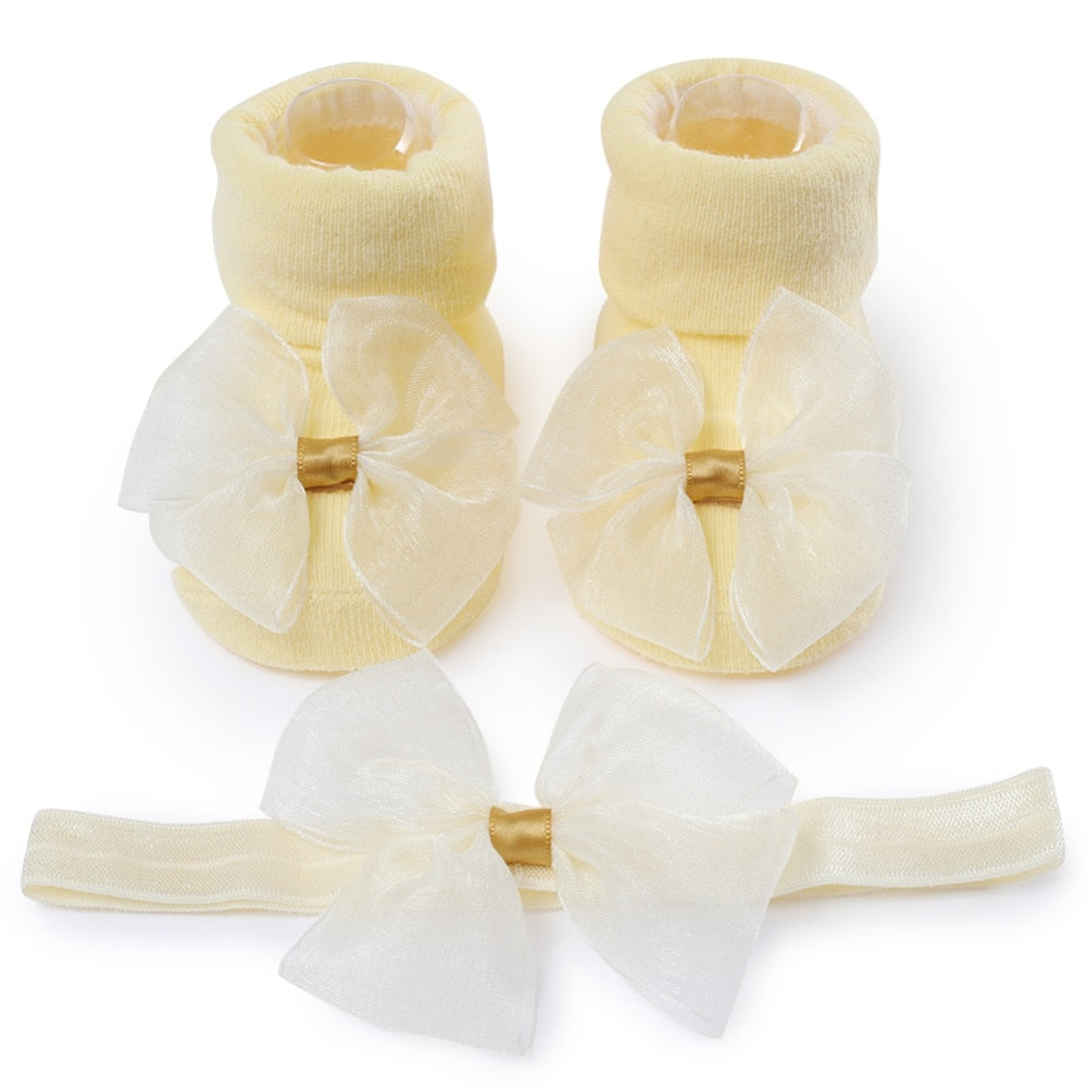 Calzino + fascia con fiocco per neonata