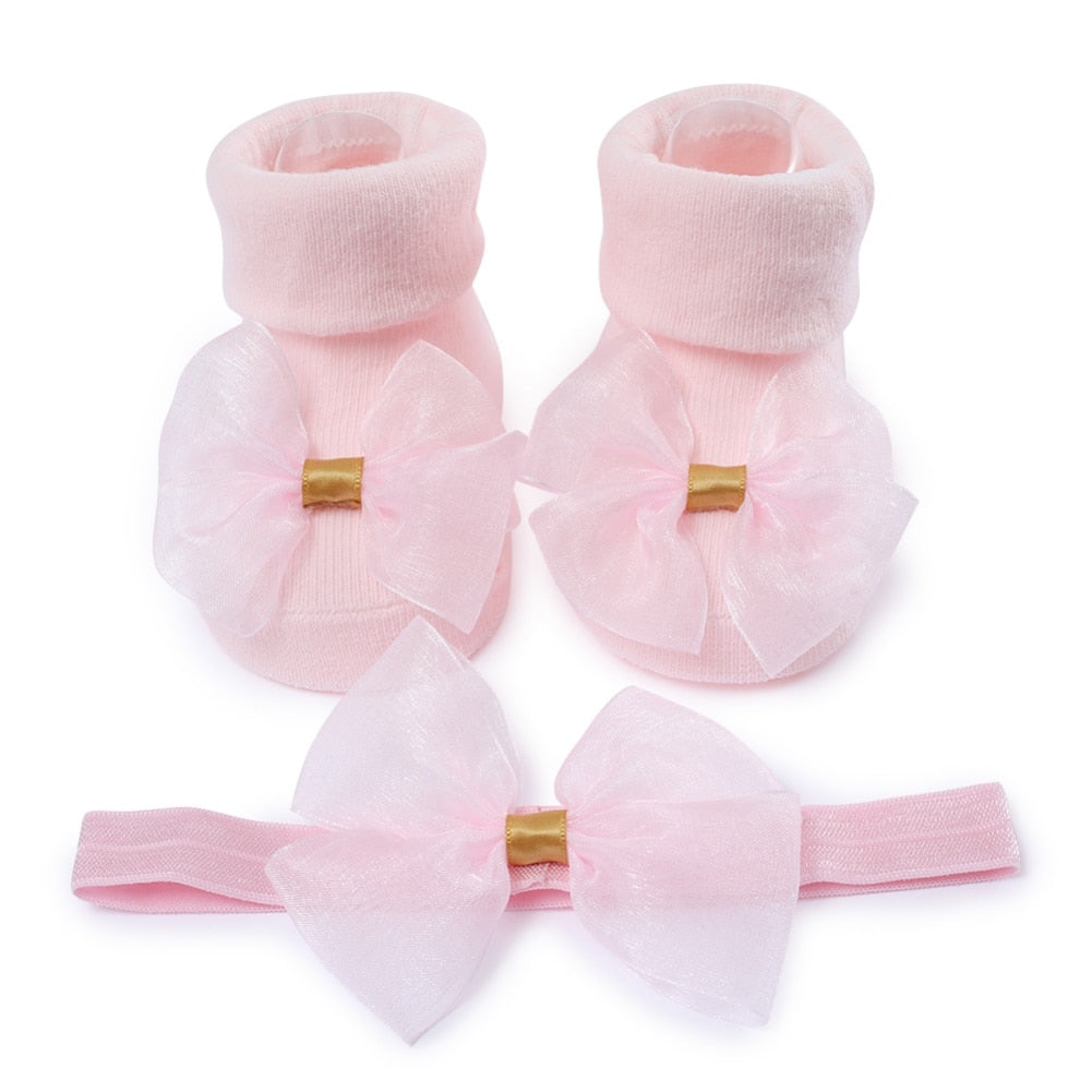 Calzino + fascia con fiocco per neonata
