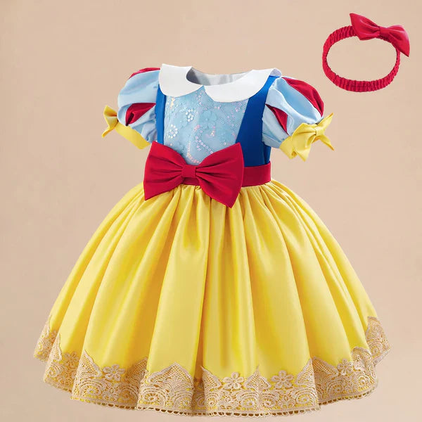 Party dress with flowers and a bow.